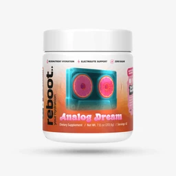 White plastic jar with a label featuring pink citrus slices on a blue-to-orange gradient, and product name Analog Dream; jar placed on a white surface.