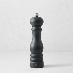 9-inch Peugeot Paris pepper mill in matte black wood with a stainless steel adjustment knob.