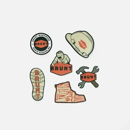 A sticker pack featuring several outdoor/workwear themed designs. It appears unisex and kid-appropriate in style, with icons including a helmet, a boot print, a boot, a wrench/hammer tool, and a circular badge; all mostly in olive green, beige, orange, and black. The visible labels show the word “BRUNT” across multiple stickers, giving a cohesive branding theme.