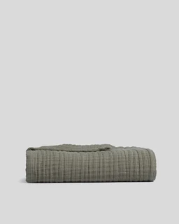 cloud-linen-gauze-throw-moss_01_8f13a15b-66e6-4644-b9ef-f7d6a0f57b39