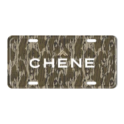 Camouflage-pattern aluminum license plate with CHÊNE branding on a white background
