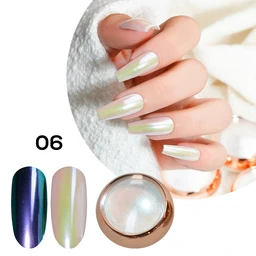 A pearlescent white and iridescent chrome nail powder in a round gold-rimmed pot, with swatch nails and a hand with long nails shown beside it on a white background.