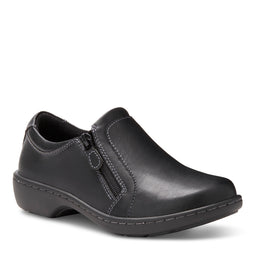 Women's Vicky Slip On in Black, angled side view with side zipper