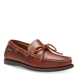 Men's Yarmouth Camp Moc Slip On in Tan, angled side view with tied lace