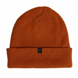 This is a burnt-orange Merino wool beanie with a thick rib-knit pattern and a folded cuff. It appears unisex in styling, shown as a simple, slouch-free knit suitable for everyday wear. Visible details include a small black tag on the cuff and a solid orange colour with a dense rib texture.