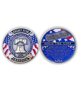 Two round commemorative coins with blue, red, and silver designs featuring patriotic motifs, placed on a white background.