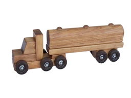 A small wooden toy tanker semi truck with a cylindrical tanker trailer, dark wheels and a warm medium-brown natural wood finish on a white background.