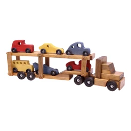 A wooden toy car carrier semi truck and trailer with six small wooden cars in red, yellow, and blue, finished in a natural honey-brown stain with black wheels, shown on a plain white background.