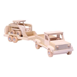 A natural unfinished wooden toy pickup truck towing a flatbed trailer carrying a wooden skidloader, set against a plain white background.