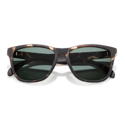 A pair of rectangular sunglasses with a full-rim tortoiseshell acetate frame in brown/cream tones and dark green lenses. The styling reads as unisex, sporty-casual, with a bold, slightly oversized silhouette and a smooth bridge. Notable attributes include the tortoiseshell pattern and the dark, reflective green lenses.