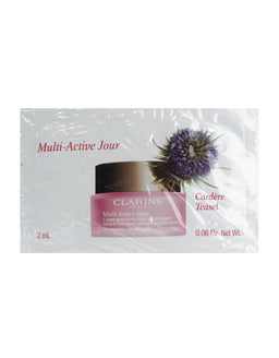 A clear sachet packet holding a small pink jar of Clarins Multi-Active Jour day cream, with a purple teasel flower printed on the white packaging.