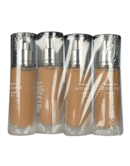 Four clear plastic-wrapped bottles of tinted liquid foundation with silver pump tops and cocoa-brown liquid, shown bundled together against a white background.