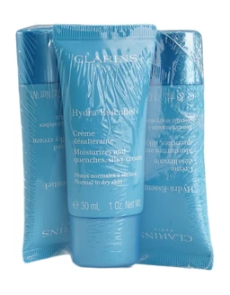 Three blue plastic-wrapped tubes of Clarins Hydra Essentiel Silky Cream, the centre one a 30 mL tube with white and blue labelling, set against a white background.