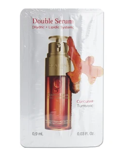 A white sachet packet printed with a red Clarins Double Serum label, showing a gold-capped dropper bottle of amber serum and a turmeric root graphic, with 0.9 mL and 0.03 fl oz printed at the bottom.