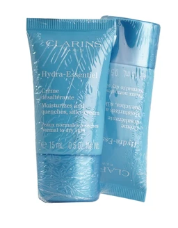 Two blue plastic-wrapped tubes of Clarins Hydra-Essentiel silky cream, one upright in front and one partly visible behind, shown against a white background.