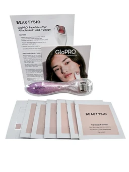 A pink glitter handheld microneedle skin roller with a silver metal head, shown with a folded instruction card, a GloPRO booklet, and several pink-and-white residue eraser and prep pad packets on a white background.