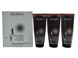 A grey and white retail box labeled Redken Smooth Activator Step 1 beside three dark brown tubes of hair smoother, each about 2 oz, on a white background.
