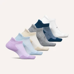 A six-pack of low-cut, ankle-length athletic socks with extra cushioning and a tab at the ankle. The set features pastel colors (lavender, pink, light blue, cream, grey, navy, white) with ribbed cuffs. Intended audience appears unisex for sports or everyday wear, with a soft knit material emphasis and cushioned sole.