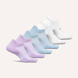 These are a set of lightweight ankle socks (Tab style) shown in a gradient of pastel colors, from lavender and light blue to white. They appear unisex in design, suitable for both men and women, with a slim profile and ribbed cuff. Notable attributes visible: ultra-light material, low-cut ankle length, and a clean, minimalist knit with no visible patterns.