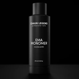 A black frosted plastic bottle of Chaun Legend EMA Monomer nail liquid, labelled 473 ml / 16 fl oz, standing on a dark reflective surface against a black background.